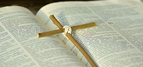 Bible with cross