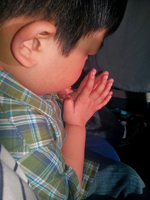 Praying boy